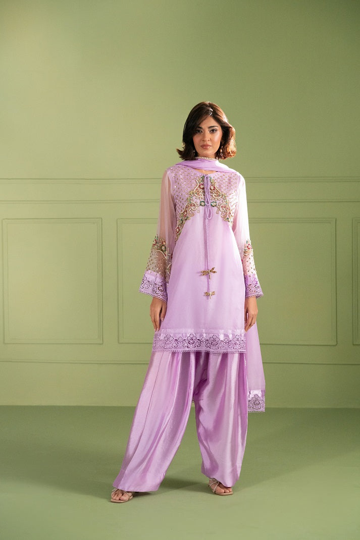 Model wearing levendour embroidered 3 piece dress